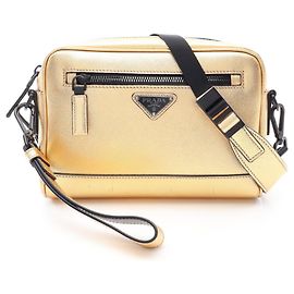 Borsa a tracolla da viaggio Prada Saffiano in Gold