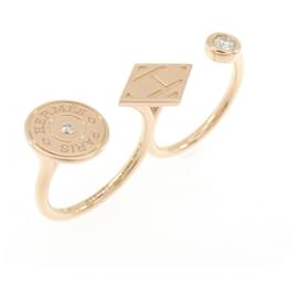 Hermès Anillo banda Hermes en oro rosa 18K con diamante