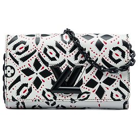 Portafoglio Twist con catena in pelle di vitello bianca con stampa grafica Louis Vuitton