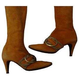 Botas altas Michel Vivien de ante naranja con hebilla