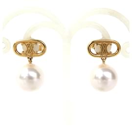 Céline Orecchini a lobo Celine Oro e Bianco