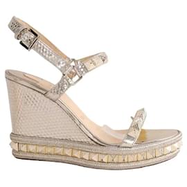 Décolleté Christian Louboutin in pelle dorata