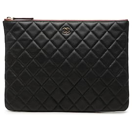 Clutch Chanel Medium Quilted Caviar O Case Nera
