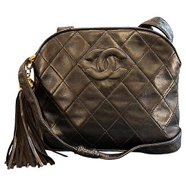Sac bandoulière Chanel CC matelassé en agneau avec pompon 1991