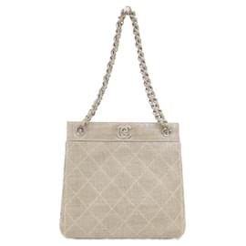 Bolso Chanel de lino beige con herrajes plateados