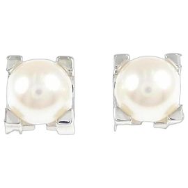 Cartier C de Ohrstecker aus Weißgold