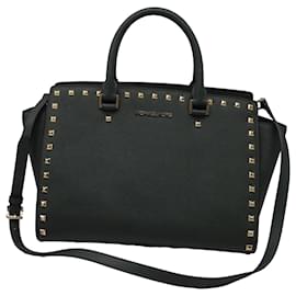 Borsa Satchel Selma Medium borchiata Michael Kors in pelle verde