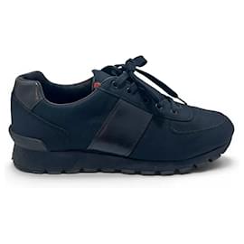 Sneakers Prada in tela e pelle nere