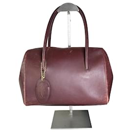 Borsa a mano vintage Cartier in pelle bordeaux con cerniera tono oro