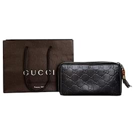 Vintage Gucci GG Geprägtes Leder Portemonnaie mit Reißverschluss Dunkelbraun Gold