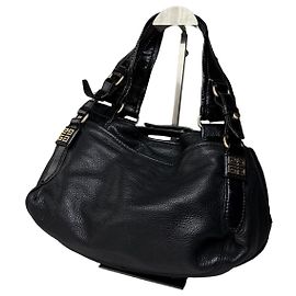 Vintage Givenchy Handtasche aus weichem Leder Schwarz Gold