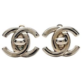 Orecchini a clip Chanel CC in ottone argentato con chiusura girevole