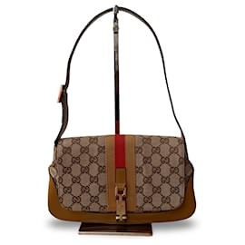 Sac à bandoulière Gucci GG Canvas et cuir noir beige