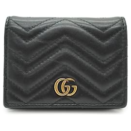 Gucci GG Marmont kompaktes Portemonnaie und Münzbeutel aus gestepptem schwarzem Leder