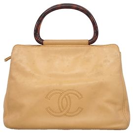 Borsa a mano Chanel in pelle d'agnello beige