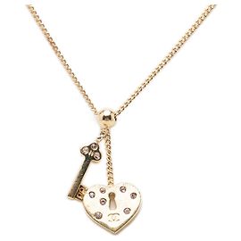Collana con pendente Chanel Gold CC placcata oro cuore strass con lucchetto e chiave