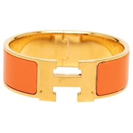 Hermès Pulsera Hermes Clic Clac H PM en Oro Naranja