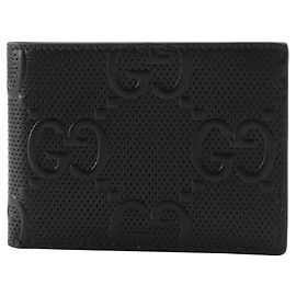 Cartera Gucci de piel de becerro grabada GG