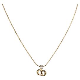 Pendentif Christian Dior CD en métal et cristaux