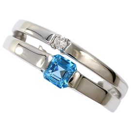 Autre Marque Ehering aus Weißgold mit blauem Topas und Diamant
