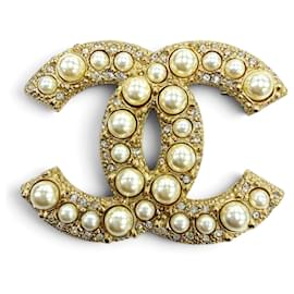 Spilla Chanel F24V Gold Coco Mark in perle finte