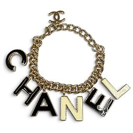 Bracciale con ciondoli dorato Chanel