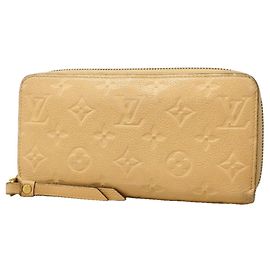 Cartera Zippy Monogram Empreinte Louis Vuitton
