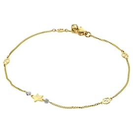 Bracciale Gucci con ciondolo stella intrecciata e diamanti