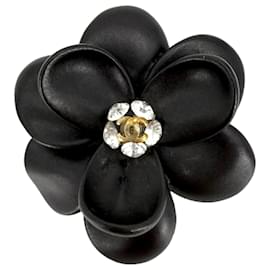 Spilla Chanel Camelia nera con strass