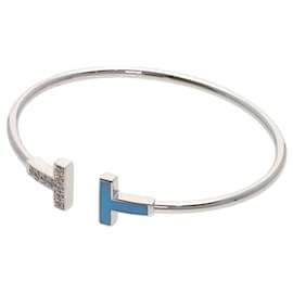 Bracciale con charm in oro bianco e diamanti Tiffany & Co.