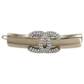 Fermi capelli Chanel strass dorato