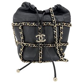 Sac à bandoulière Chanel noir et blanc