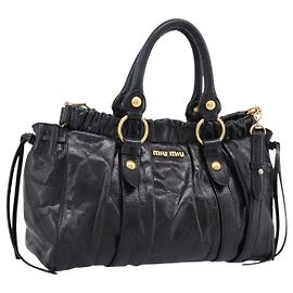 Borsa a mano Miu Miu in pelle 2way nera e oro autentica 198610M