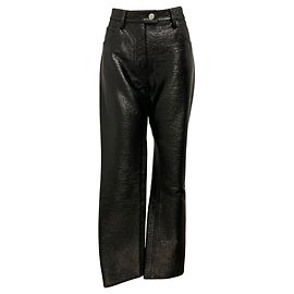 Pantalones Courreges de piel sintética charolada plisada negra