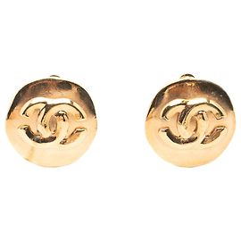 Orecchini a clip rotondi Chanel CC placcati oro