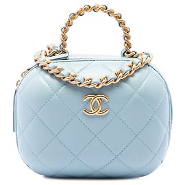 Beauty case Chanel CC Bubble in pelle di agnello matelassé blu con tracolla a catena