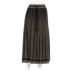 Gucci Falda plisada de lana con estampado GG