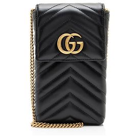 Borsa a tracolla per telefono Gucci GG Marmont in pelle matelassé