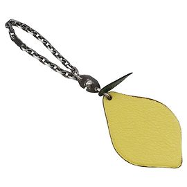 Charm per borsa Hermès in pelle Lemon