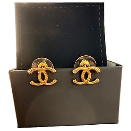 Orecchini a lobo Chanel CC Logo in metallo dorato