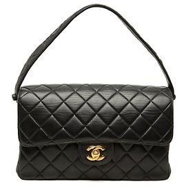 Borsa Chanel CC trapuntata in pelle d'agnello nera con patta doppia
