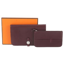 Hermès Hermes Dogon Duo GM Lederlanges Portemonnaie in Rot