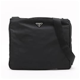 Borsa a tracolla Prada in nylon Tessuto con logo triangolare in pelle