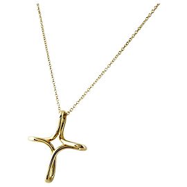 Collana con pendente Tiffany & Co. motivo croce in oro giallo