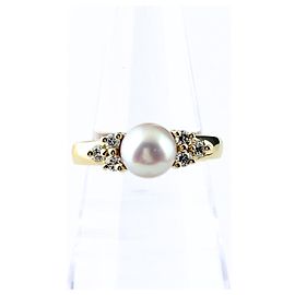 Anillo banda Tiffany & Co. de oro amarillo con diamantes y perla