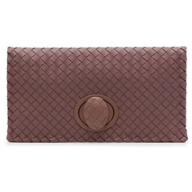Clutch Bottega Veneta in Nappa Intrecciato rosa con chiusura a rotazione