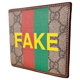 Portafoglio Gucci in tela GG Supreme con strisce