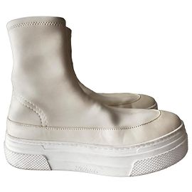 Khaite Botines de plataforma en cuero beige