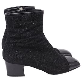 Stivaletti con punta quadrata Chanel in glitter nero