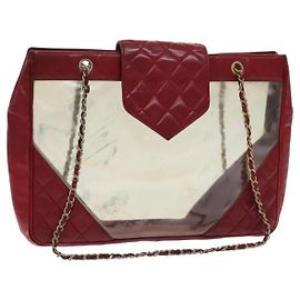 CHANEL Matelassé Schultertasche mit Kette, aus rotem Vinyl, mit CC-Logo, Artikelnummer MX212.